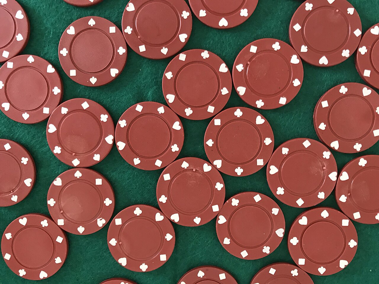 Chips placed across inside and outside sections of a roulette layout